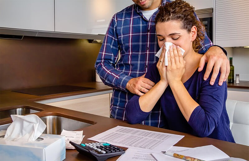 woman crying about debt