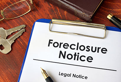 foreclosure notice on a foreclosure defense lawyer desk