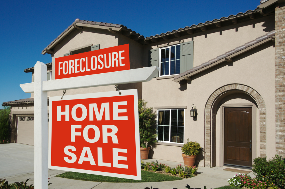 foreclosure home for sale sign