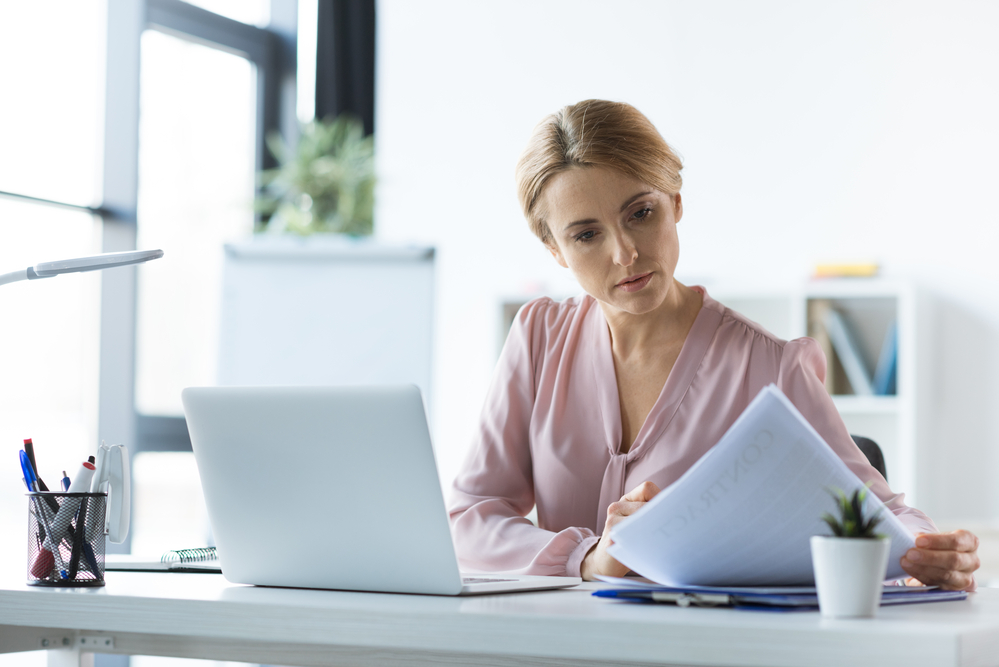 woman with credit card bills