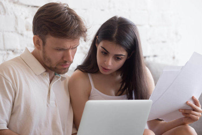 Couple reviewing bankruptcy options together