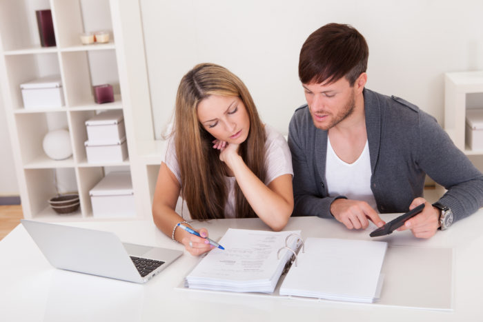 Couple reviewing bankruptcy options together