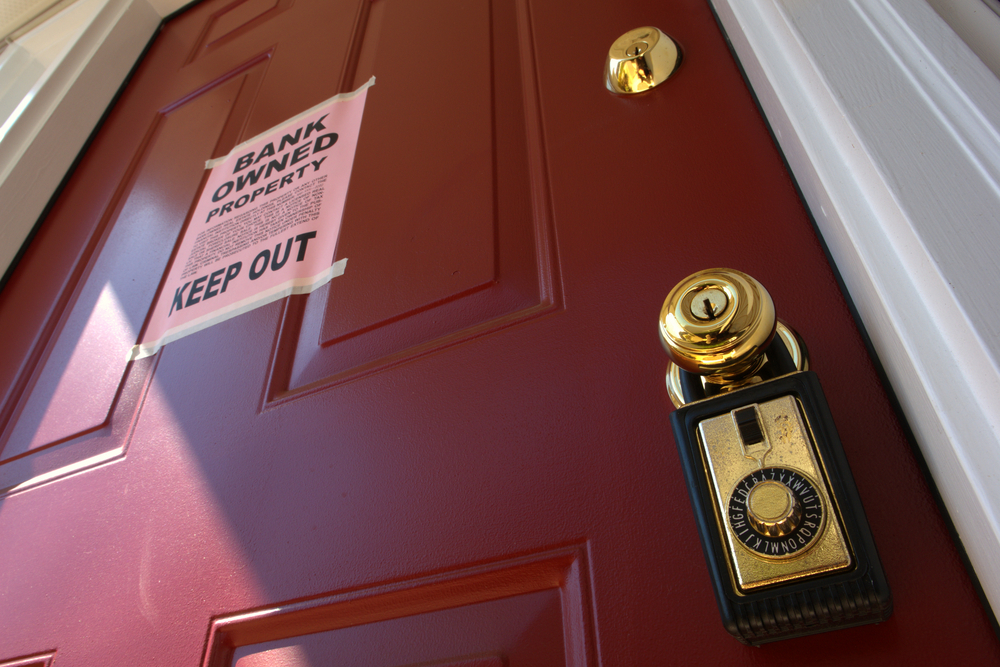 bank owner property sign on foreclosed home