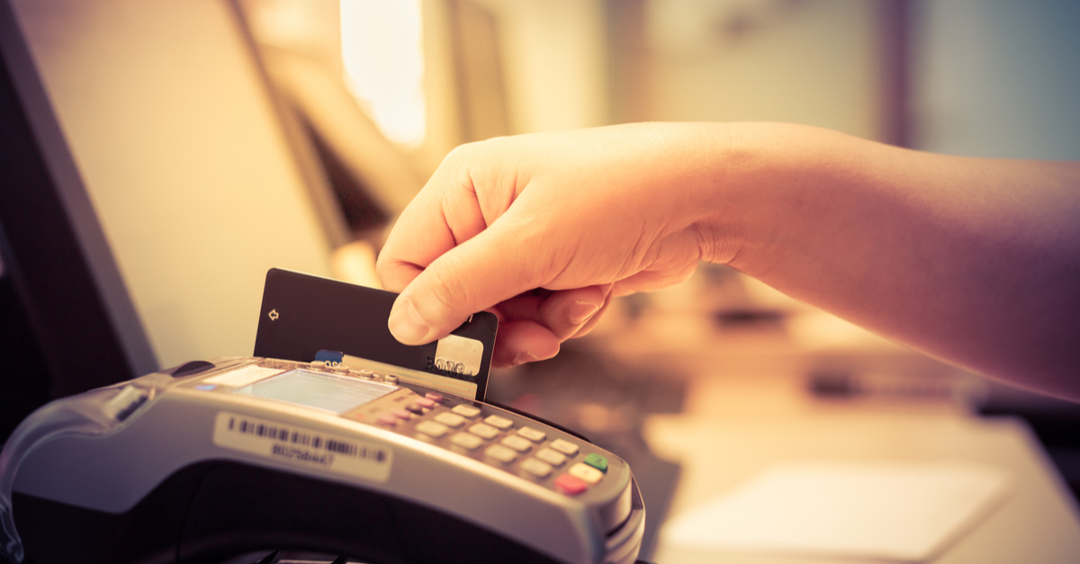 Moment of payment with credit card through a credit card machine