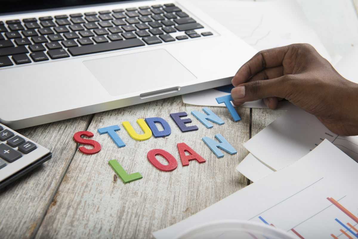 student loan letters on wood