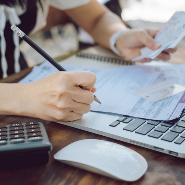 Woman is checking credit card bill information