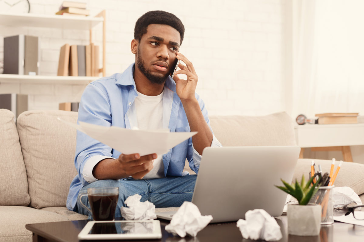 man from Florida talking on the phone with a debt collector