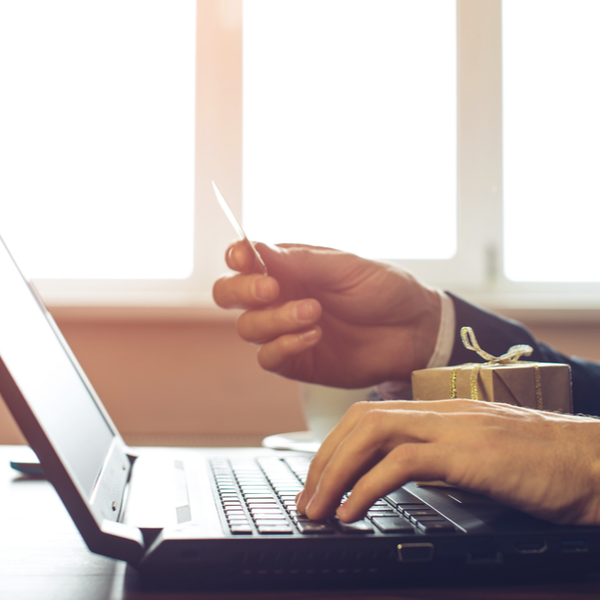 A man buying a gift online via credit card