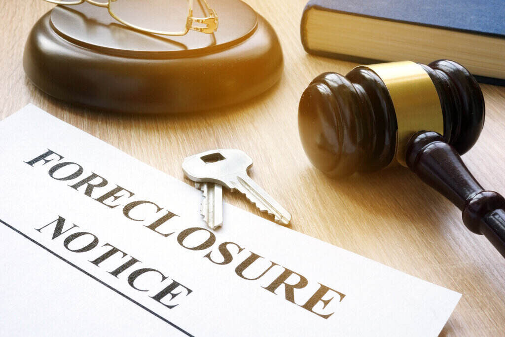 Foreclosure notice, gavel and keys