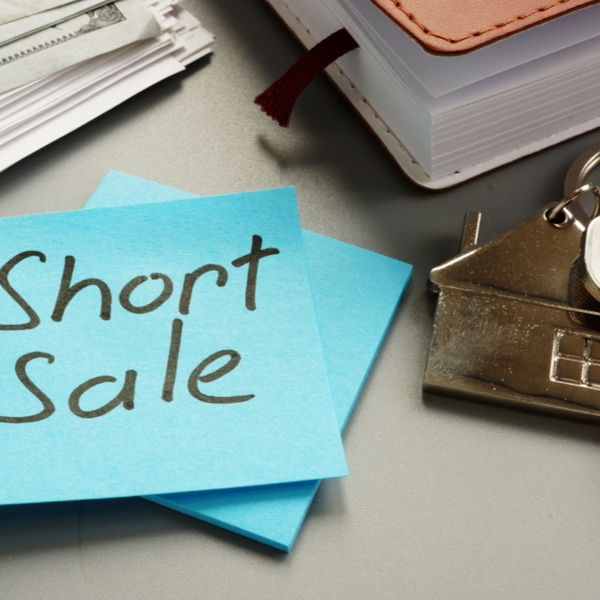 text sign showing hand written words of short sale