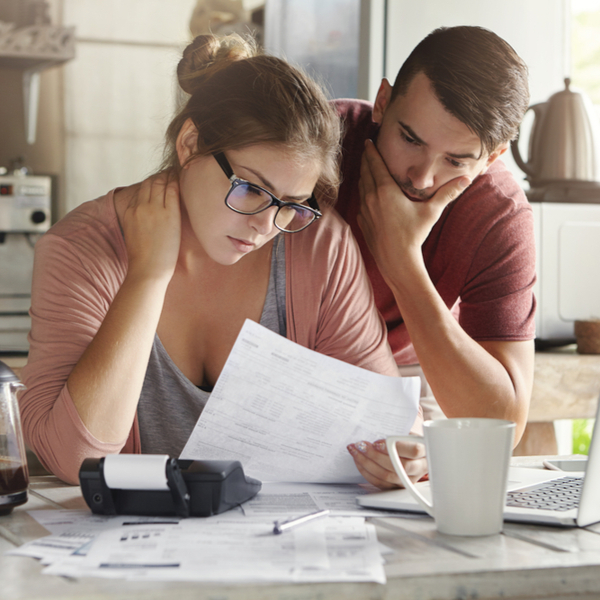 young family having debt problems