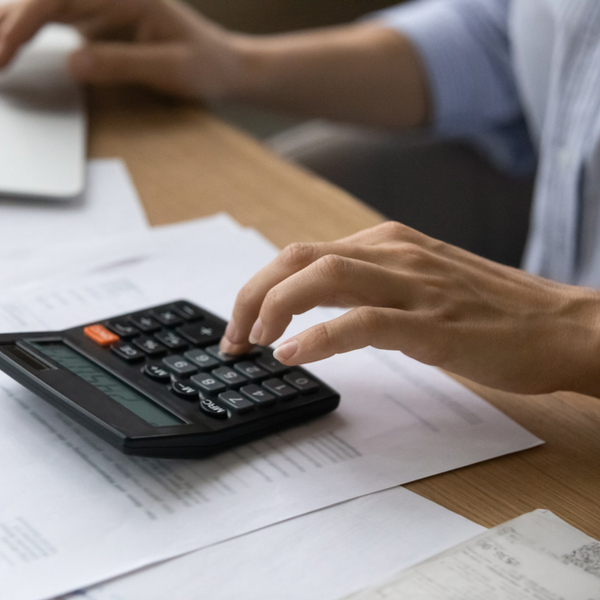 a woman calculating medical debts