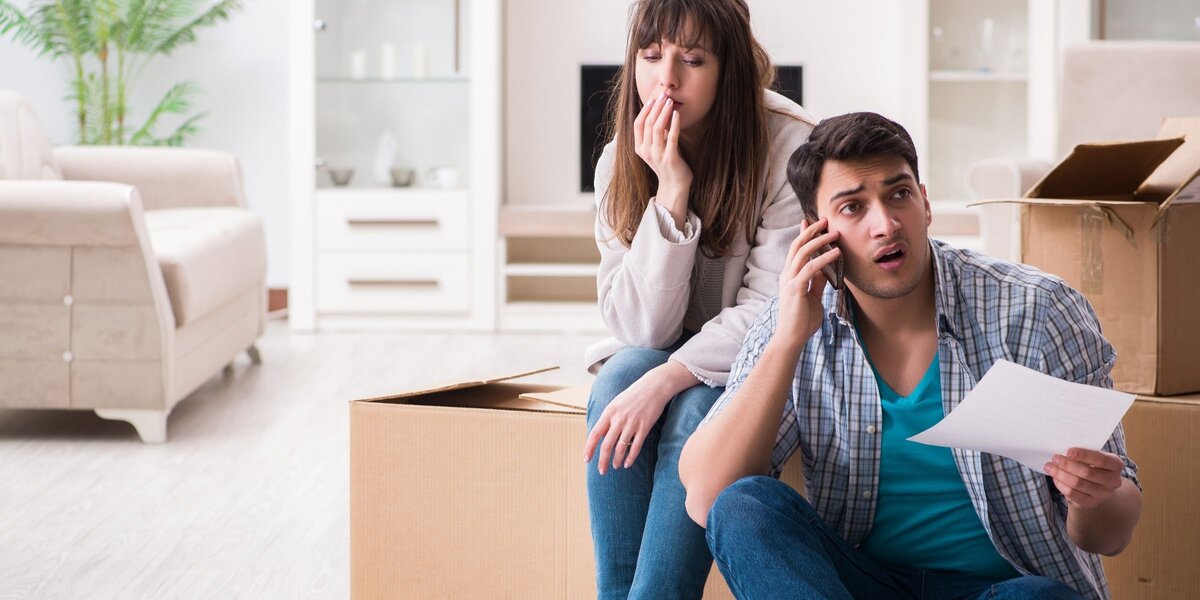 Worried couple talking on the phone