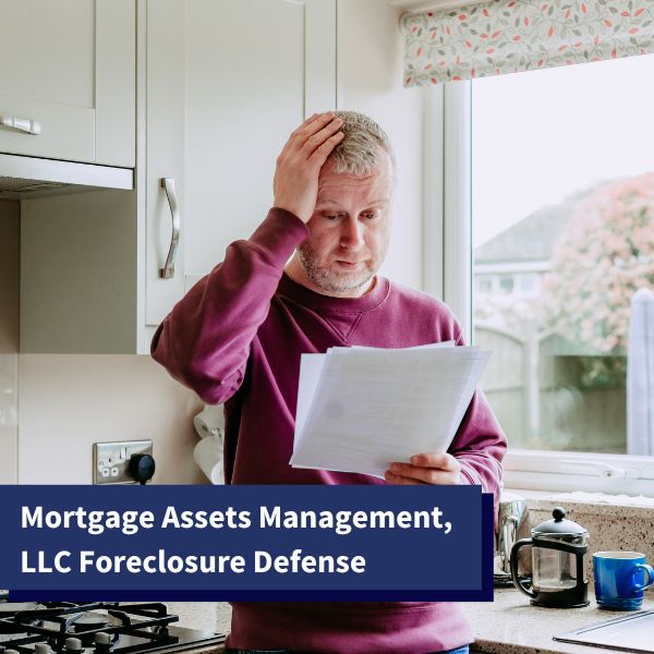 Man reading a notice from Mortgage Assets Management, LLC